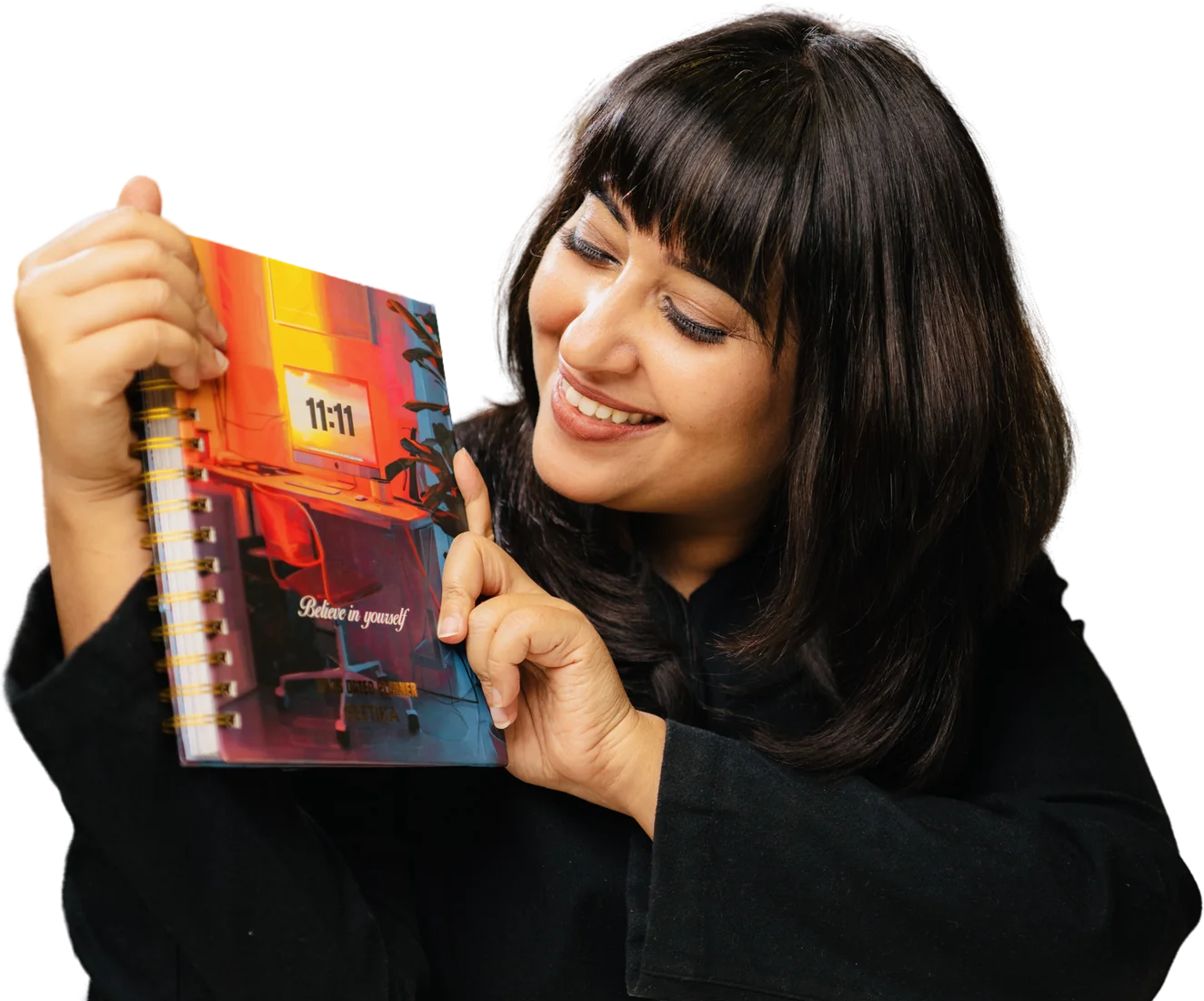 Geetika Khurana holding her 11:11 journal