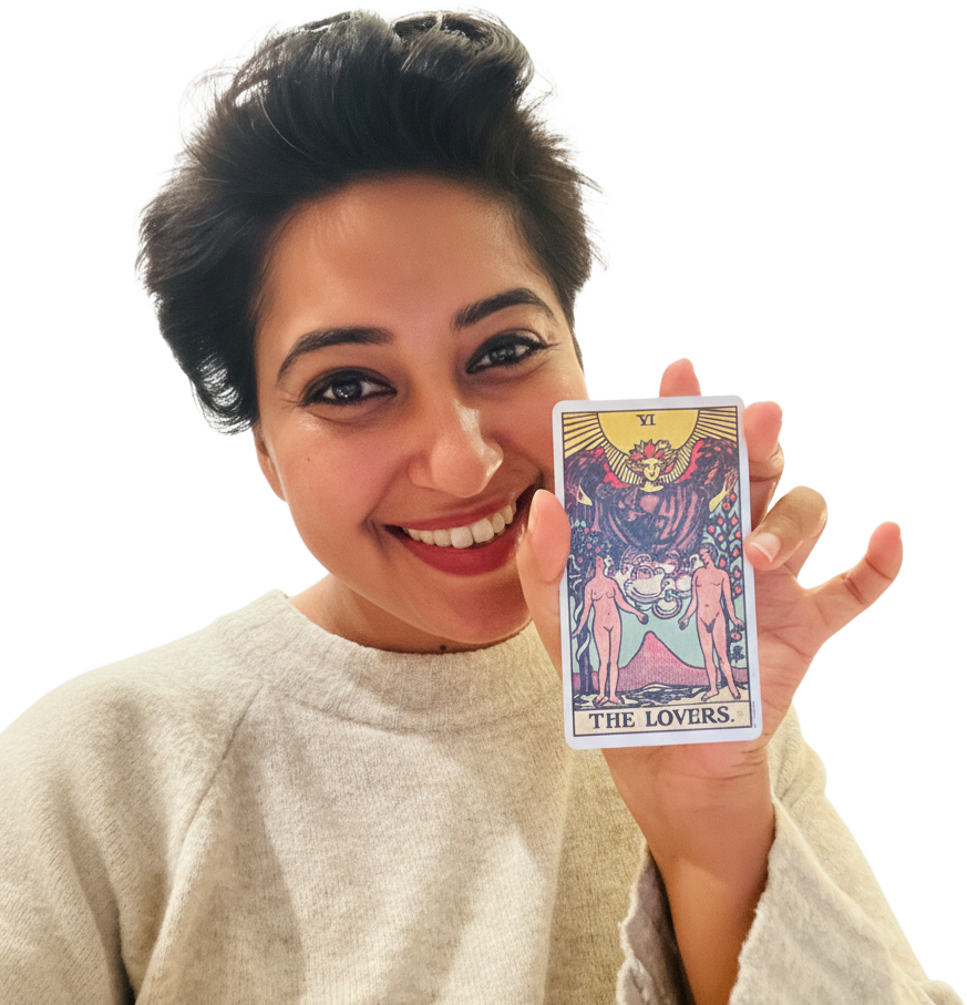 Geetika Khurana holding The Lovers tarot card
